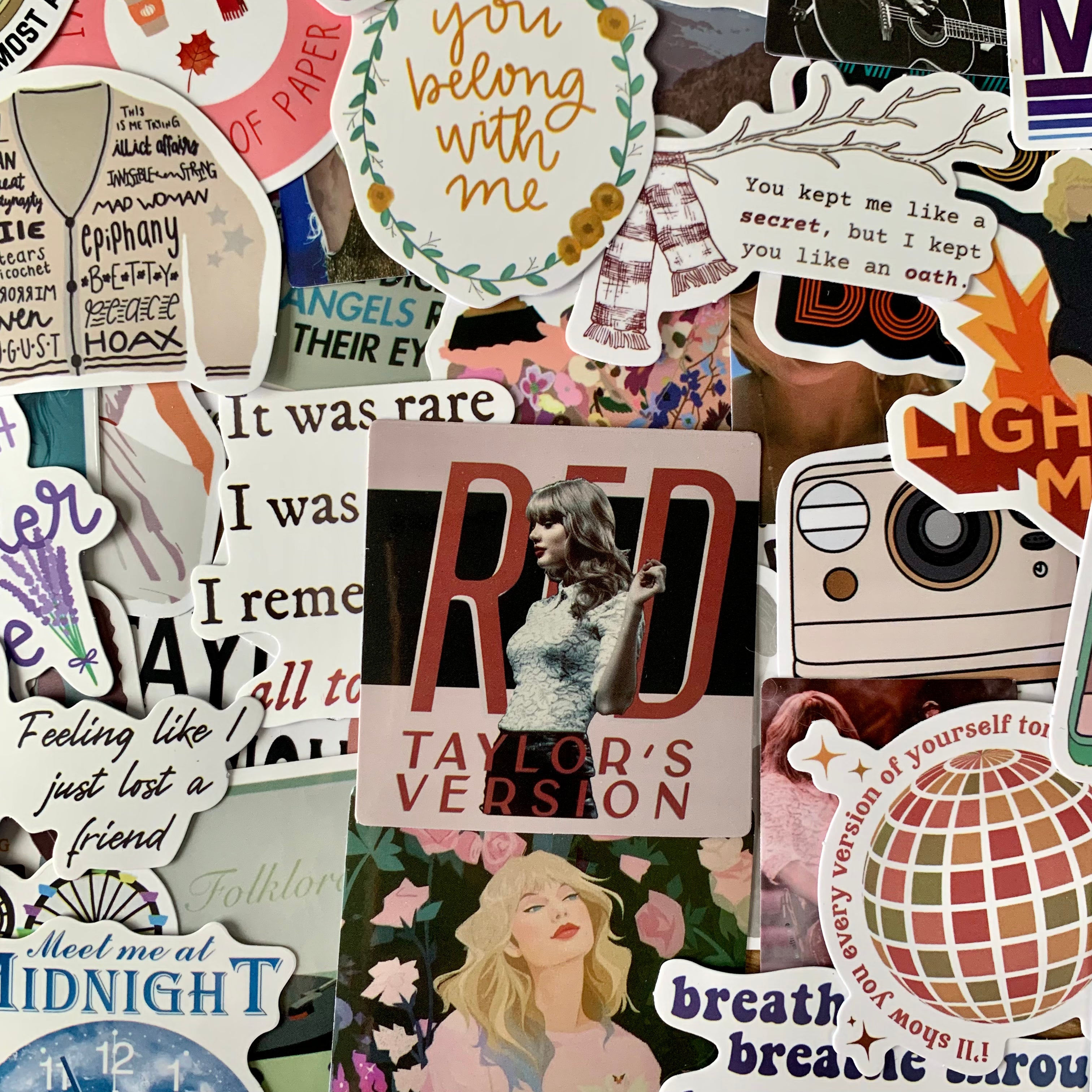 I got a Taylor sticker pack on  and I can't for the life of me figure  out what these 2 stickers reference.. am I blanking on something obvious?  😅 : r/TaylorSwift
