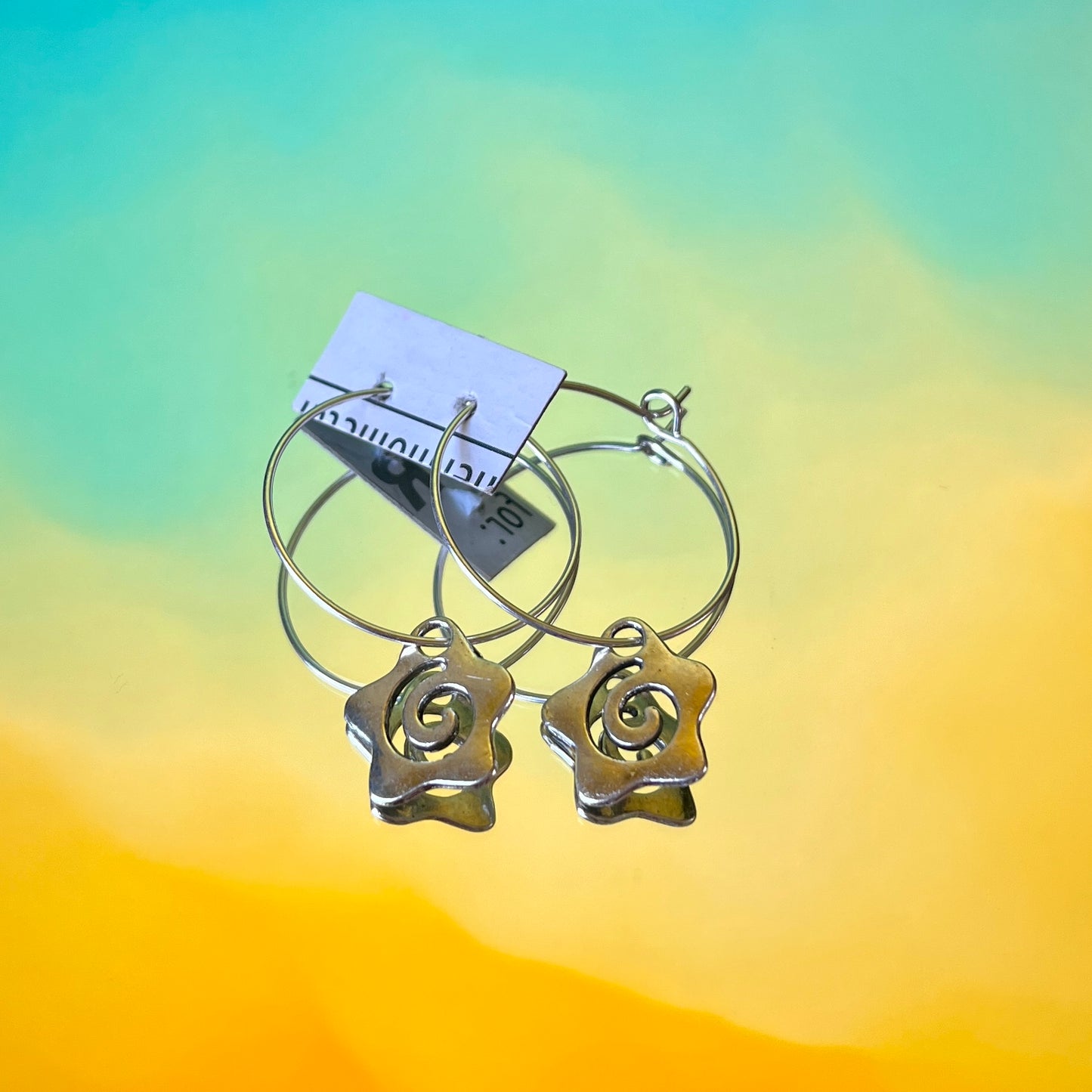 SWIRLY STAR EARRINGS