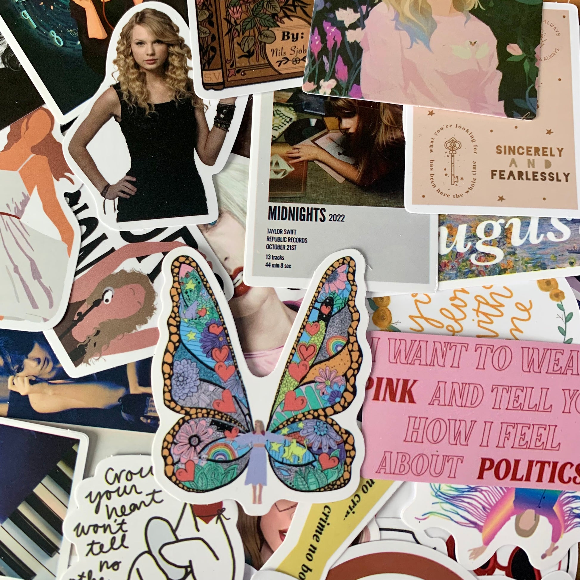 I got a Taylor sticker pack on  and I can't for the life of me figure  out what these 2 stickers reference.. am I blanking on something obvious?  😅 : r/TaylorSwift