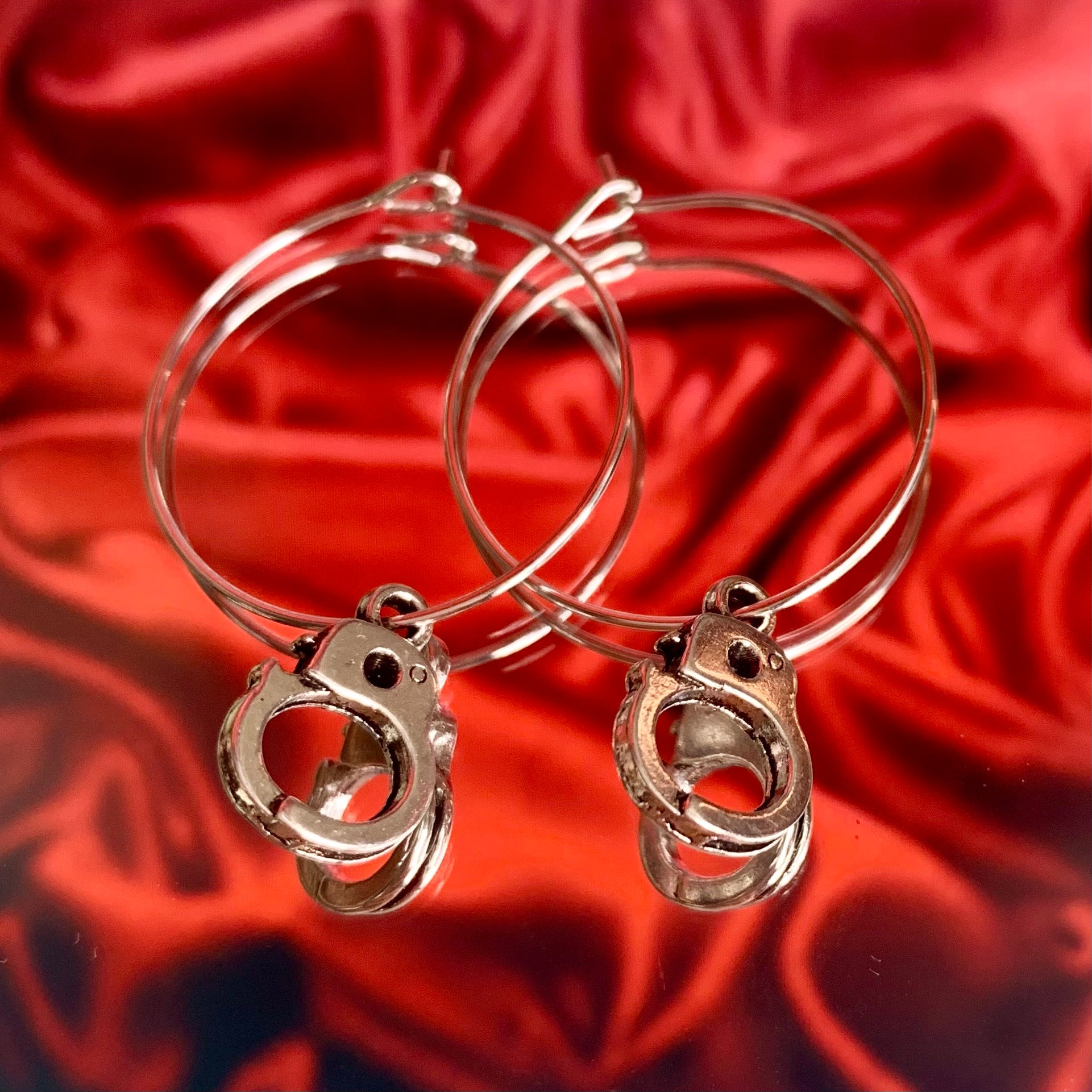 Silver deals handcuff earrings